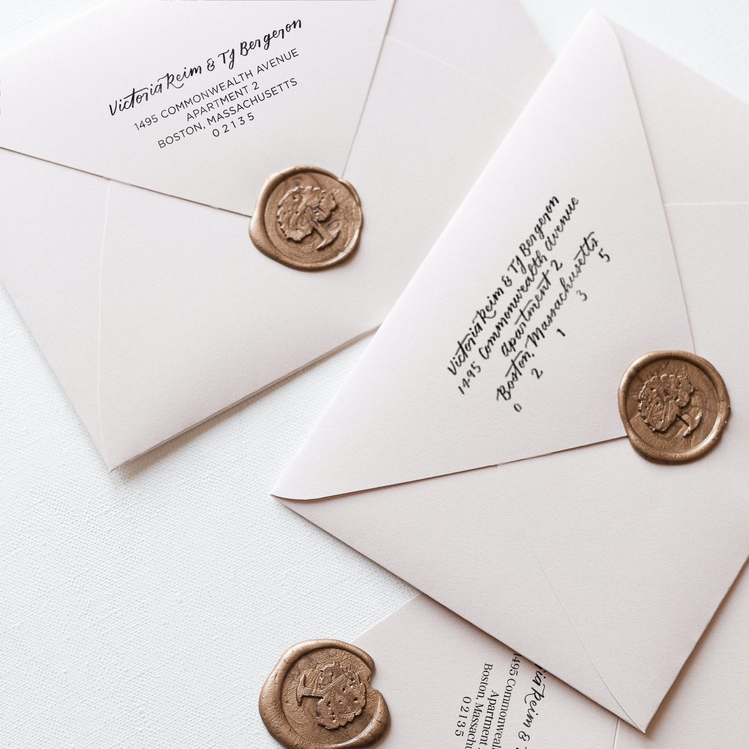 envelopes with rubber stamped calligraphy return address